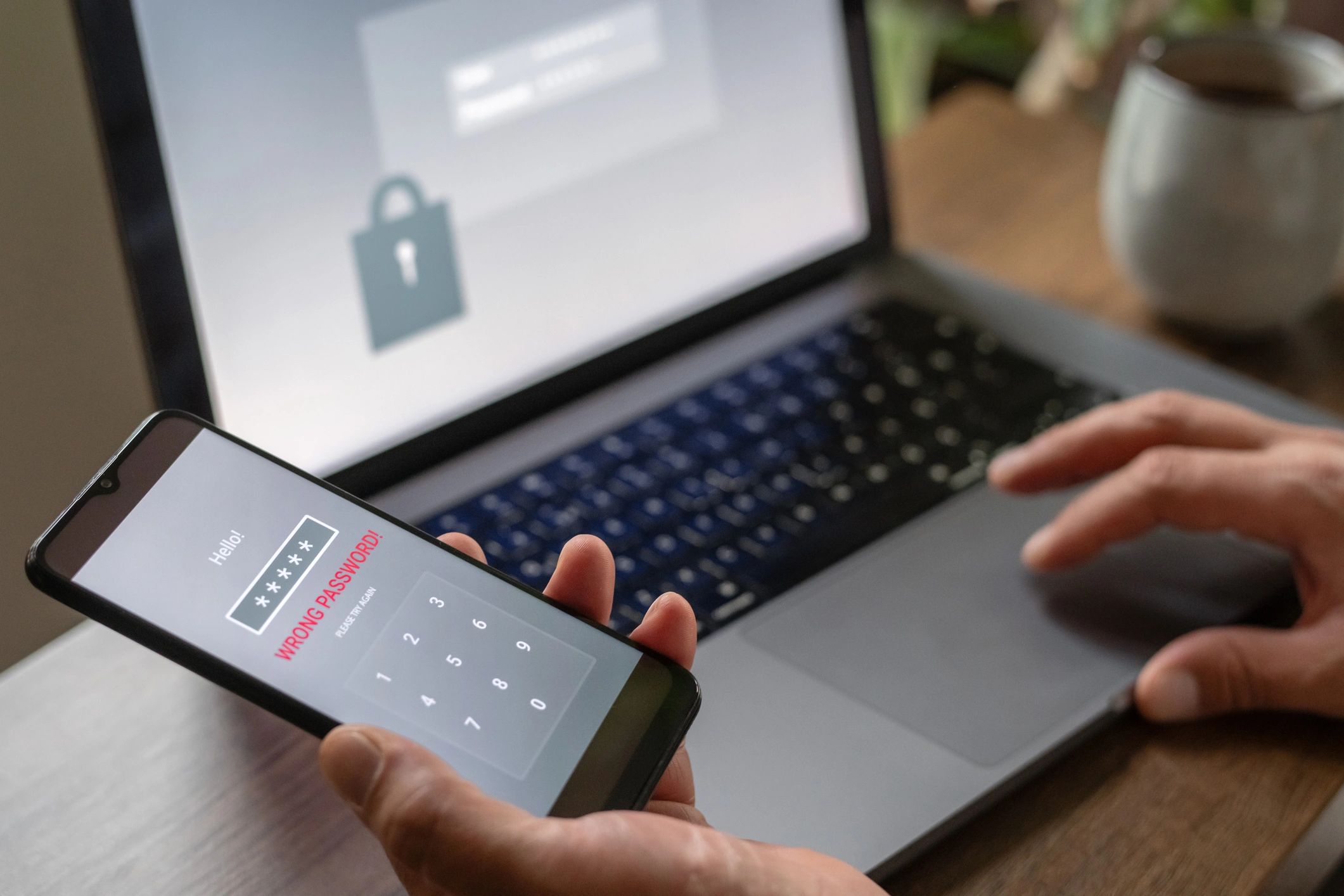 Person holding smartphone security screen